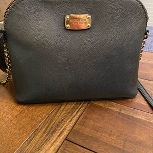 Michael Kors black crossbody bag. Gently used. Strap is fraying.